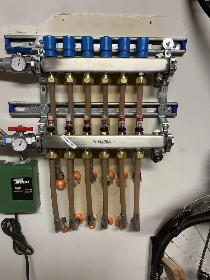 Plumber performing Gas Line Installation at a residential property in Norwalk